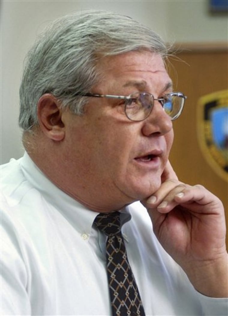 In this 2006 file photo, police Chief Leonard Gallo talks with reporters at the East Haven, Conn., police station. 